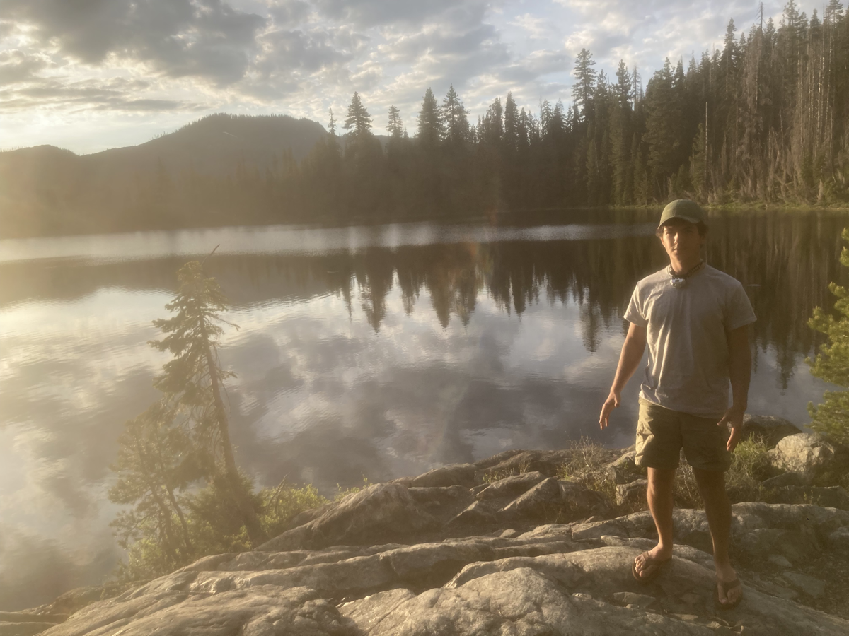 Hiking by a mountain lake in the PNW